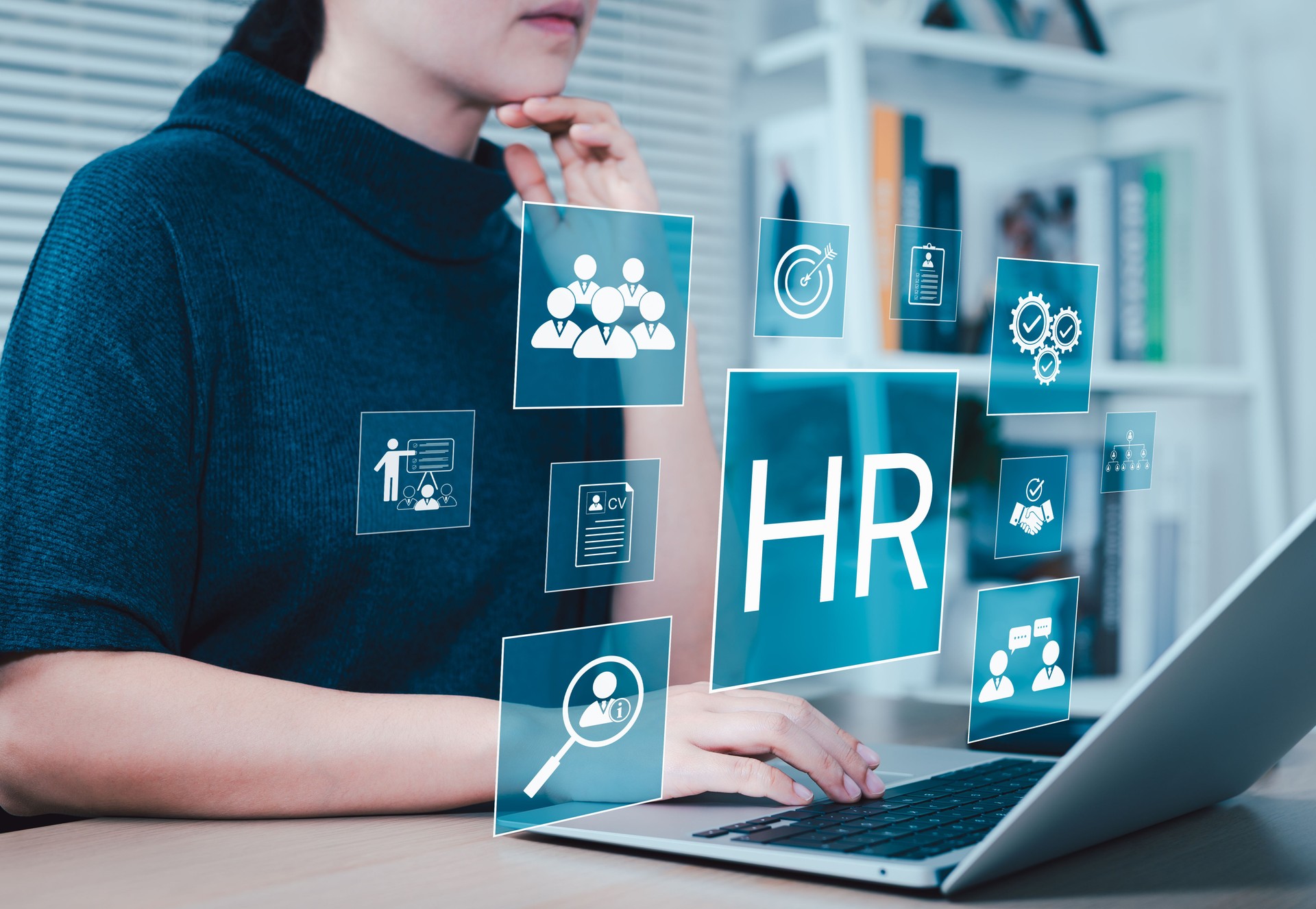 HR, HRM, Human resources management concept. Businesswoman works on laptop with HR icon representing human resource, recruitment, training, employee information, and checking resume of job applicants.